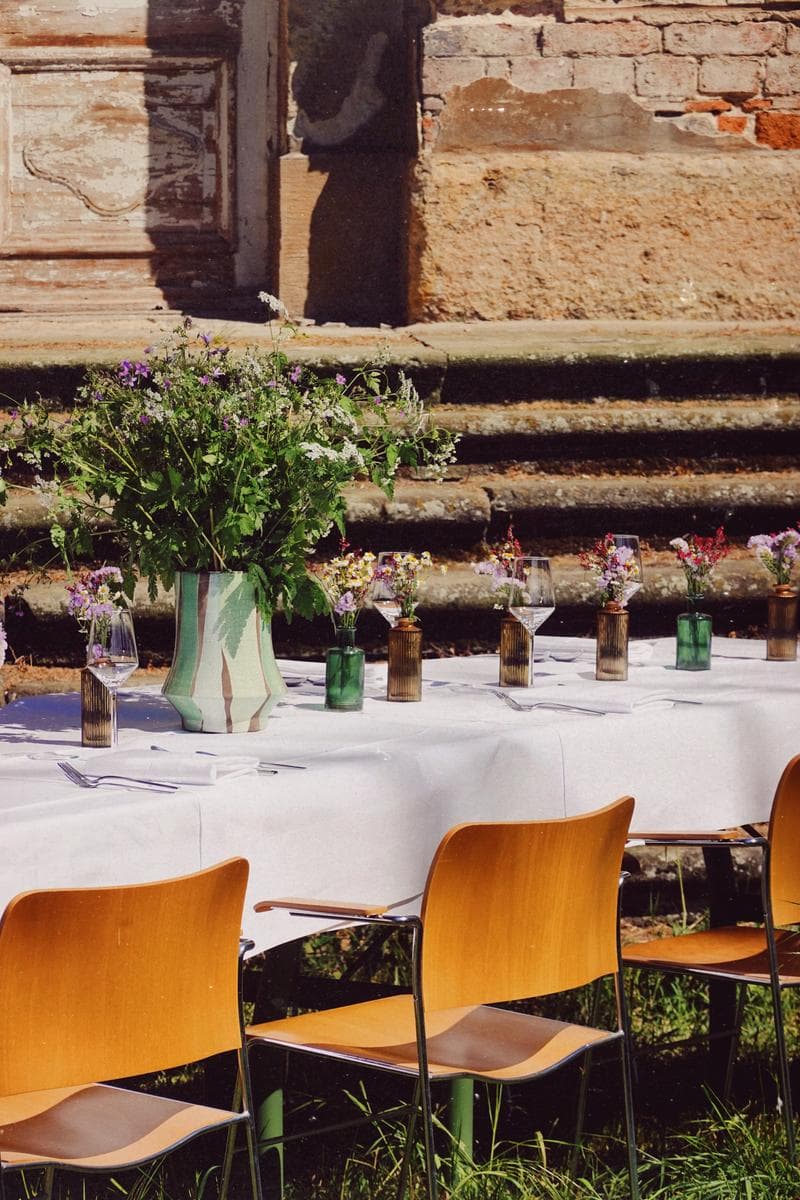 Outdoor dining table set in the castle courtyard